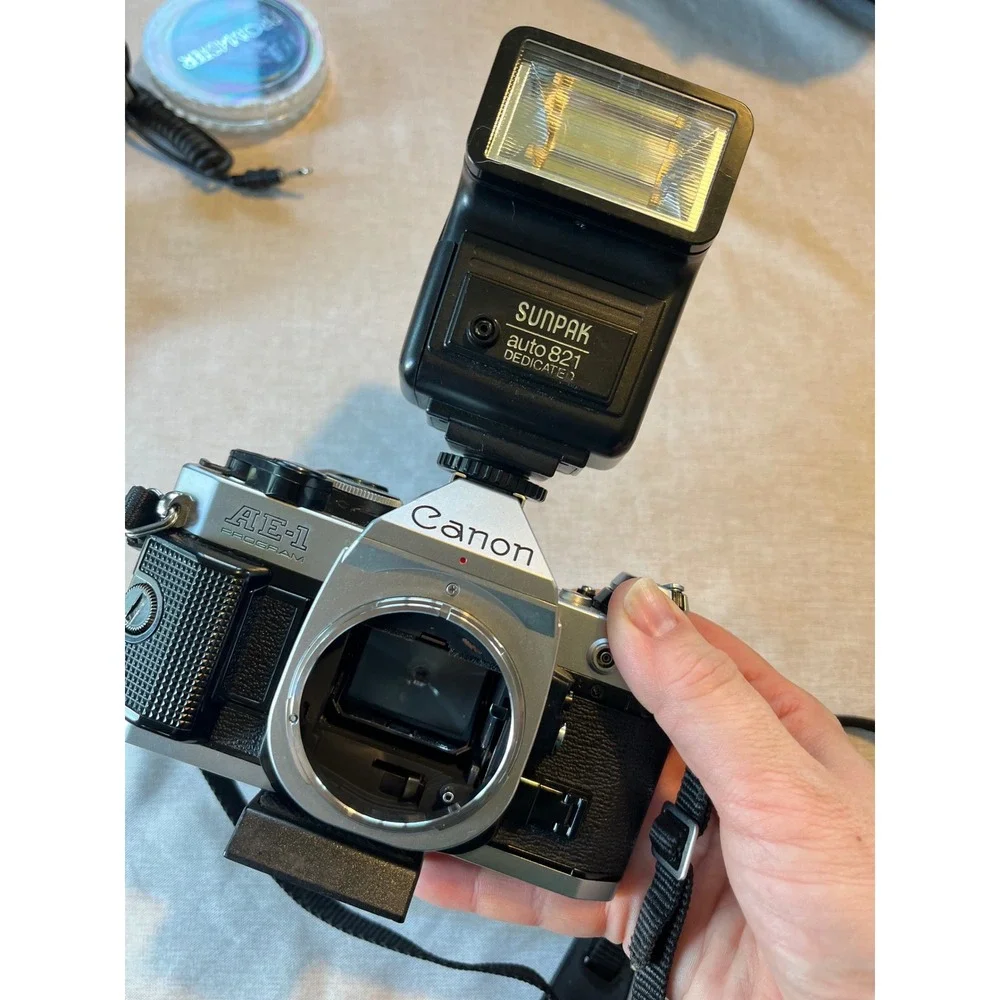 Canon AE-1 Program 35mm SLR Film‎ Camera Bundle with 50mm Lens Flash and Bag